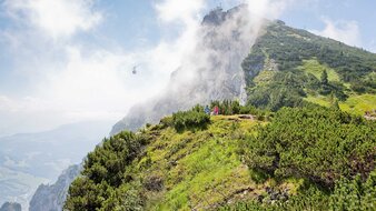 Bergspitze mit in einer Wolke versteckten Gondel | © SalzburgerLand Tourismus